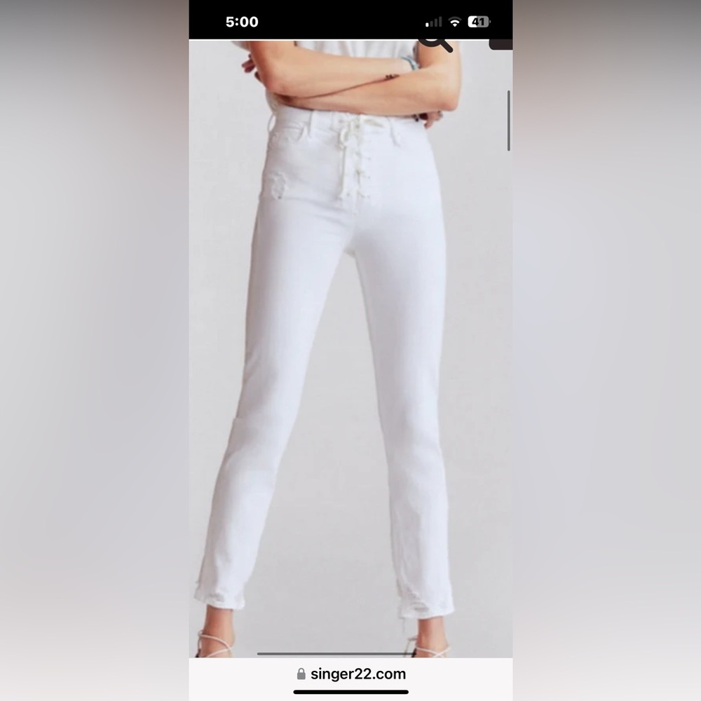 Like new straight jeans with a laced-up fly, distressed details chewed-up hem